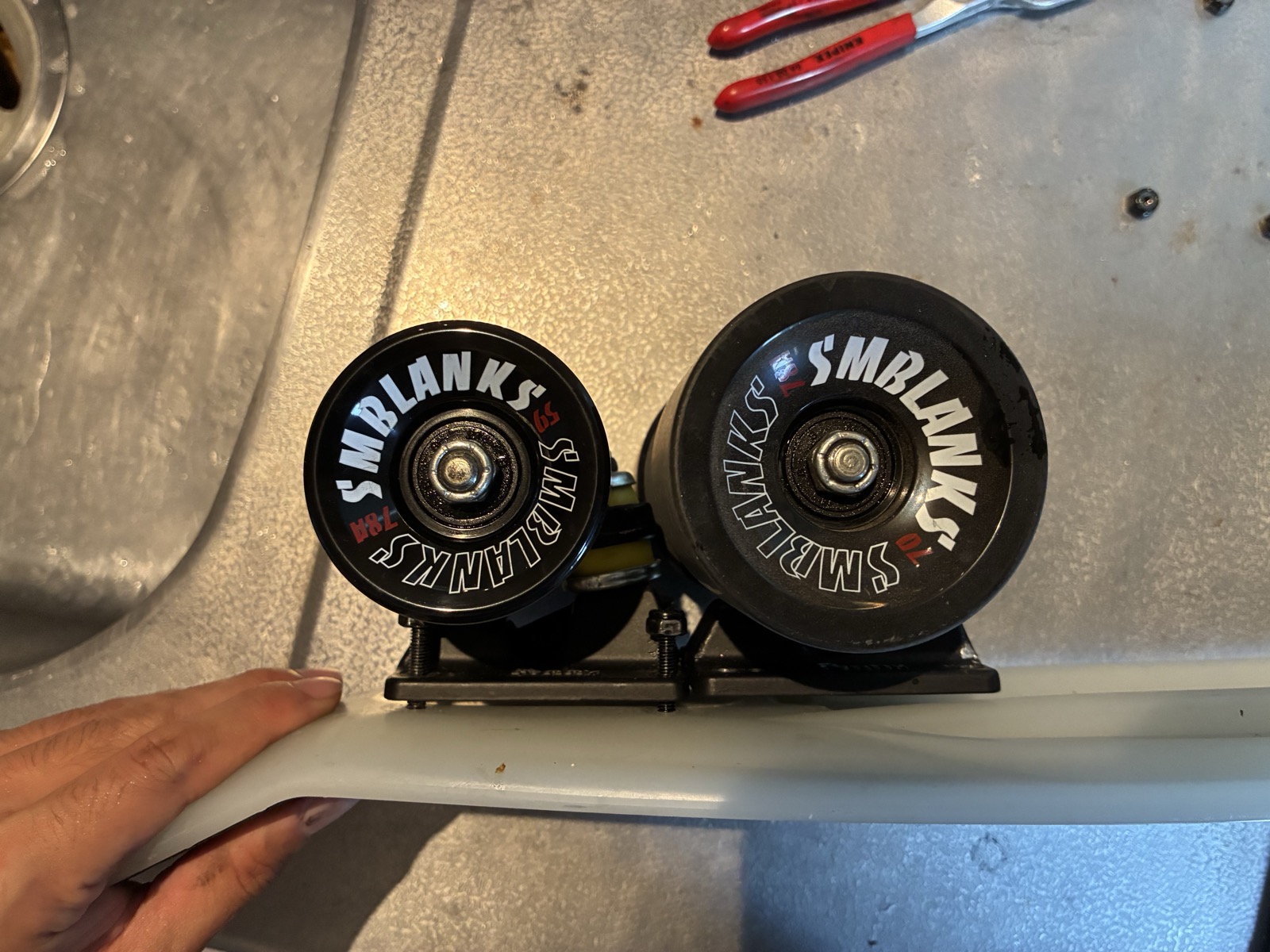 Penny board with oversized wheels — a setup prone to wheel bite